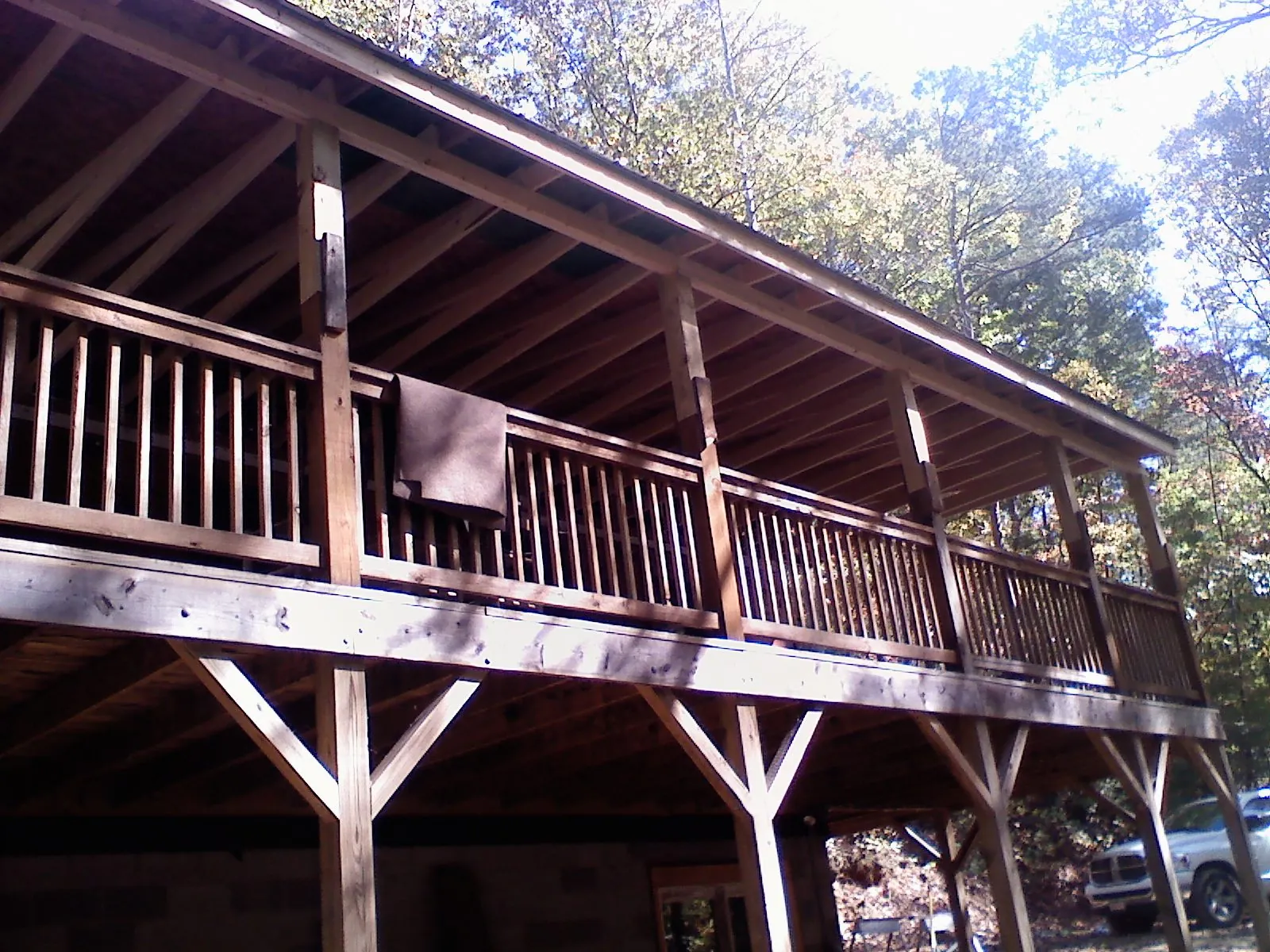 Timber framing under a new elevated porch and deck — Roof Leak Repair in Pompano Beach by Roofing Brothers